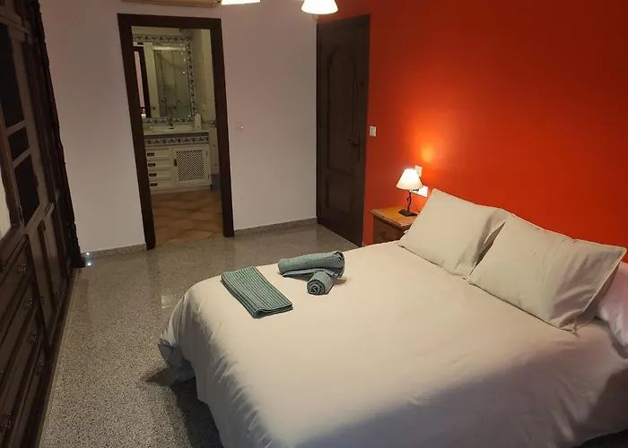 Habitaciones La Flamenka